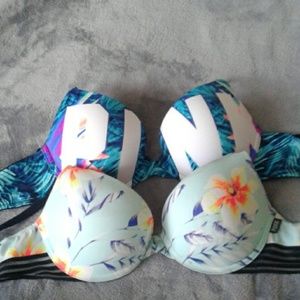 Two pink Victorious Secret bras both floral patter